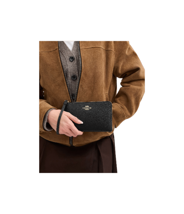 Muñequera coach un cierre negro liso