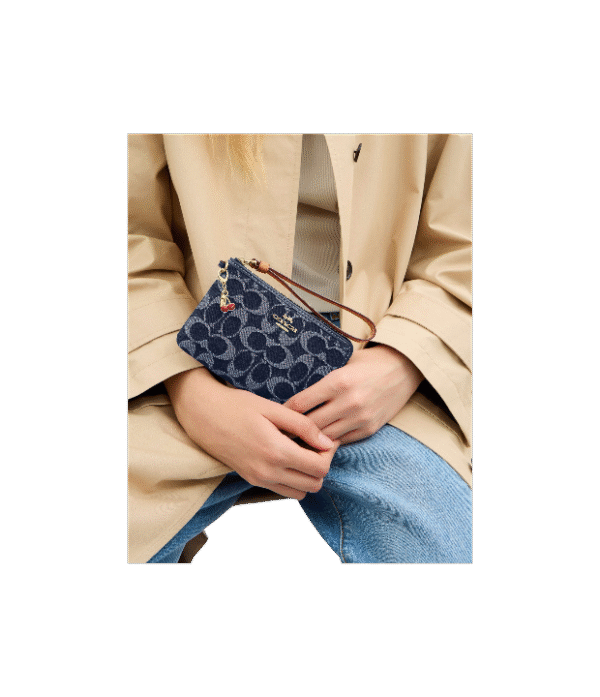 Muñequera coach un cierre denim cerezas