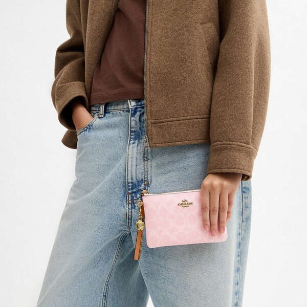 Muñequera Coach Rosa